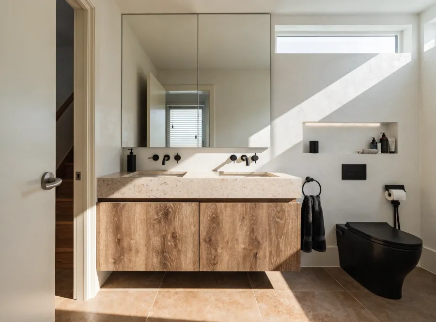 Fully remodeled bathroom with new vanity, tile, and modern fixtures